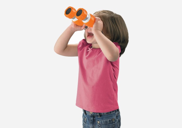 Girl holding fisher price kids tough binoculars