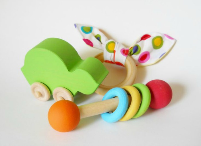 Gift Sets for Babies: Handmade, wooden toys like these make a sweet baby shower or christening gift for babies.