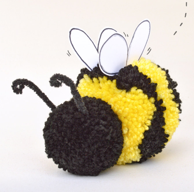 Insect and Bug Crafts for Preschoolers: Loving this pom pom bumblebee, complete with cute antennae and tiny wings.