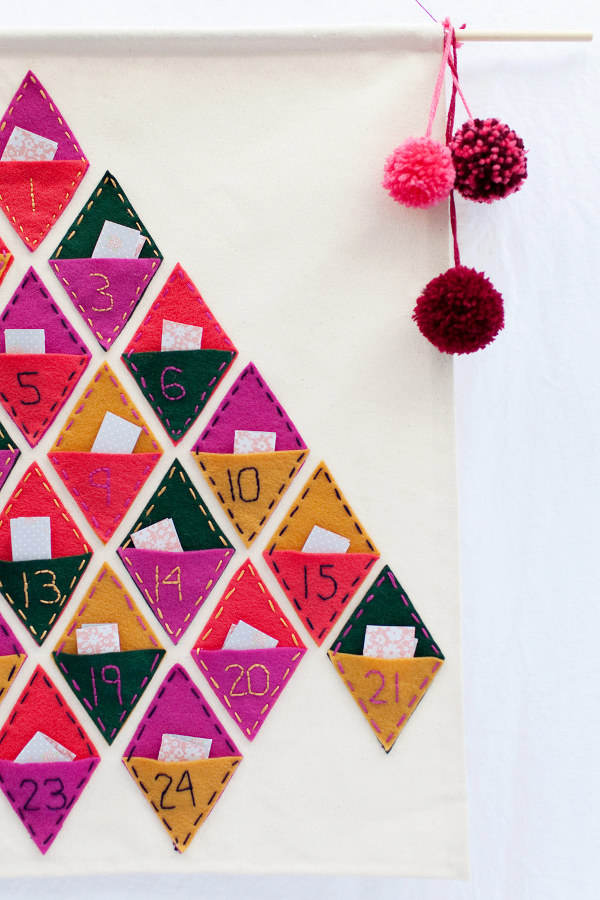 How many sleeps left until Christmas? 11 stylish DIY advent calendars to help you start the countdown the Christmas. Felt advent calendar via Tell, Love and Party.