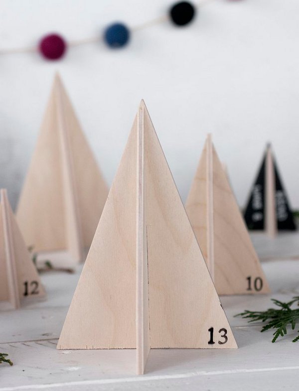 How many sleeps left until Christmas? 11 stylish DIY advent calendars to help you start the countdown the Christmas. Wooden tree advent calendar via A Merry Thought