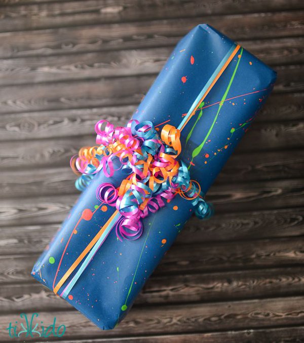 Make your own gift wrap - neon splatter paint gift wrap