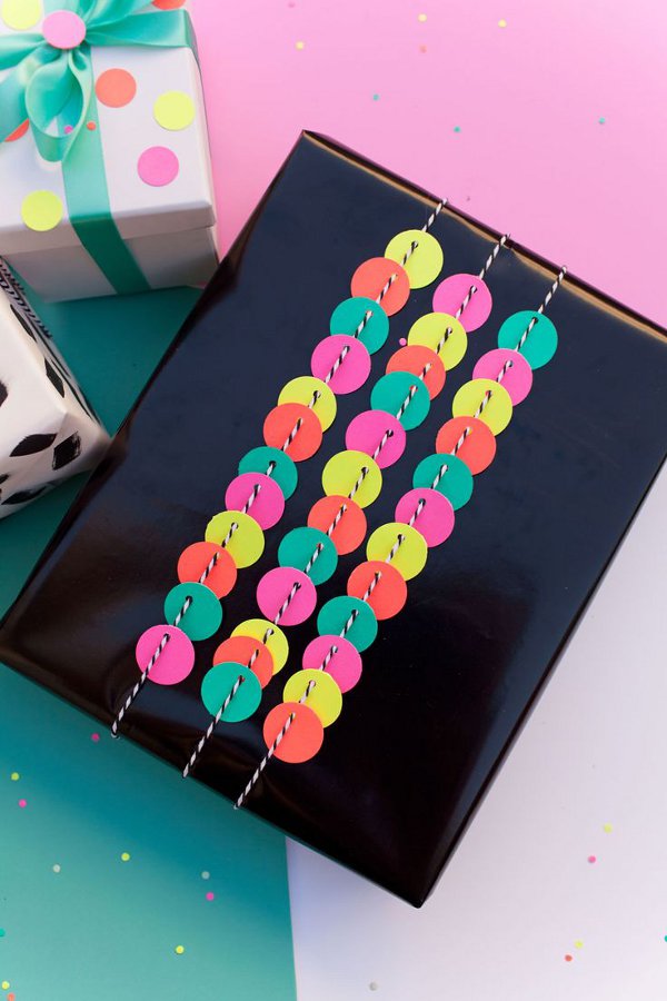 Make your own gift wrap with kids - punch hole gift wrap