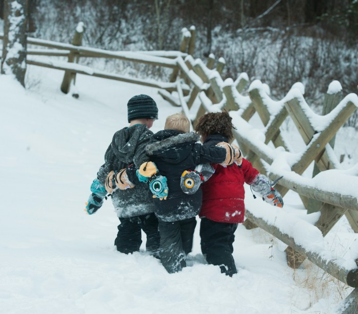 Mittyz thumbless gloves - boys walking in snow with mitts on