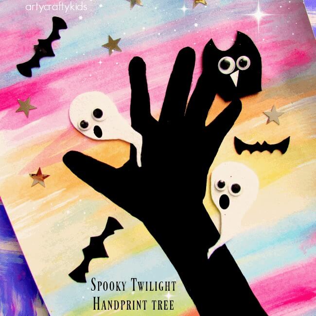 Easy Kids Halloween Crafts - Spooky Twilight Handprint Tree (via Arty Crafty Kids)